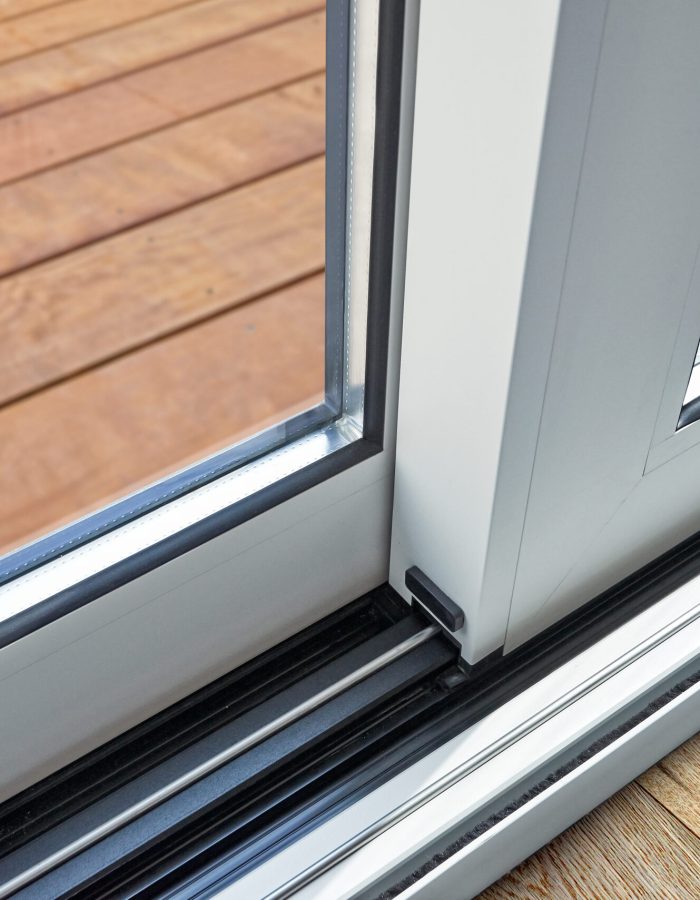 Sliding glass door detail and rail embed in floor